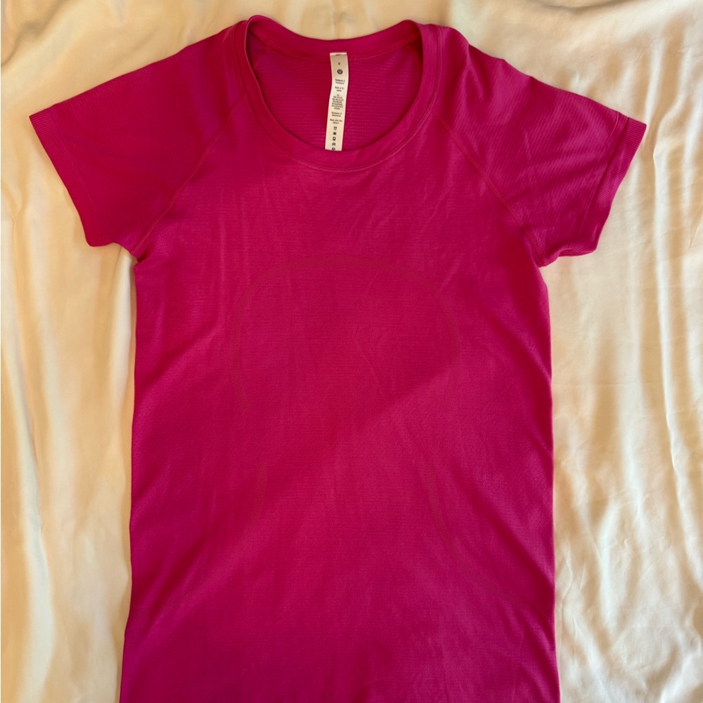Pink lululemon swiftly tech size 8